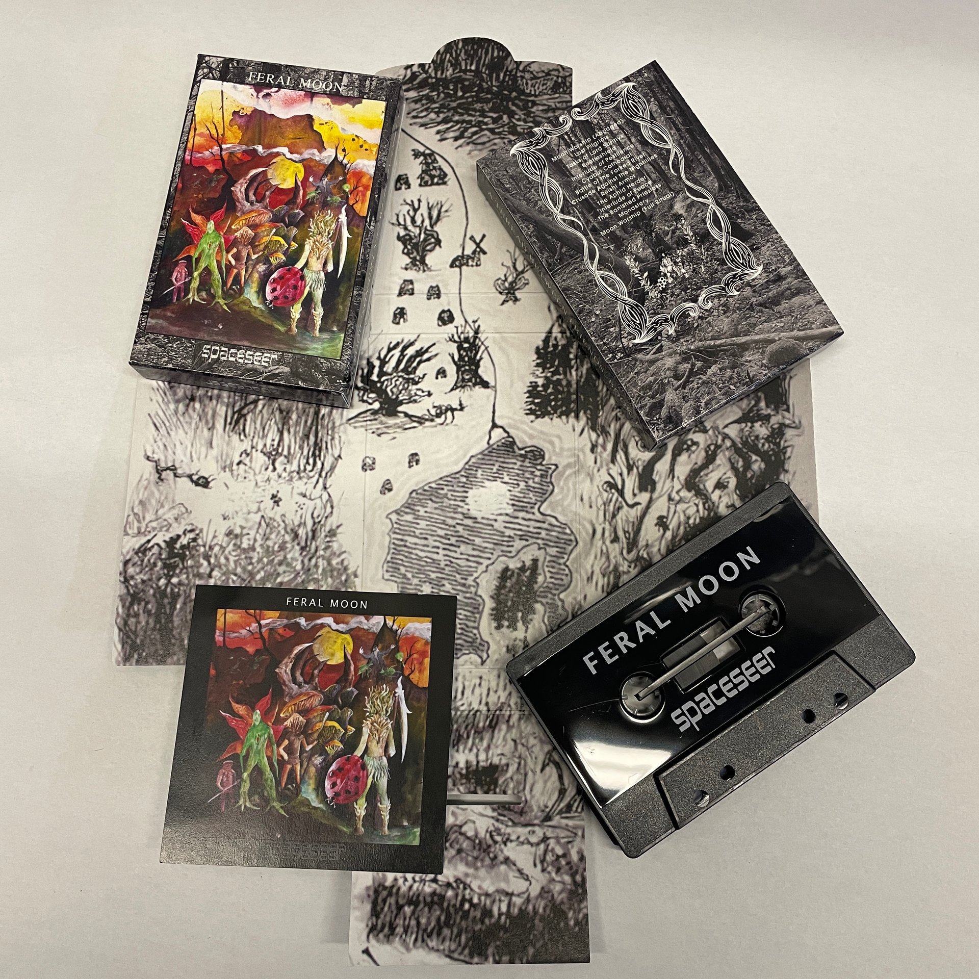 Feral Moon - First Edition Cassette on Black Marble Shells, Maltese Cross Case