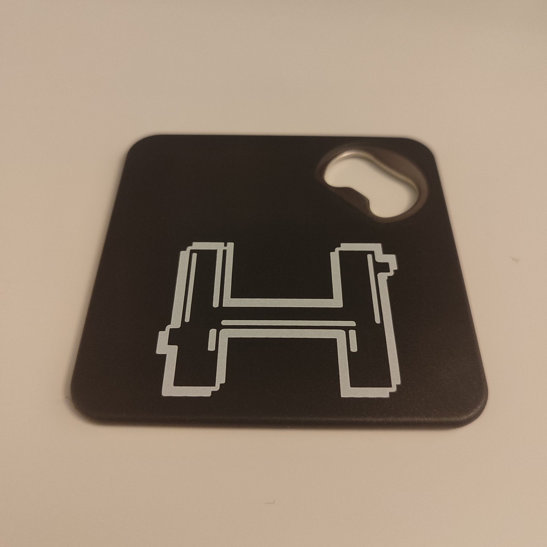 Harbiter custom coaster with bottle opener