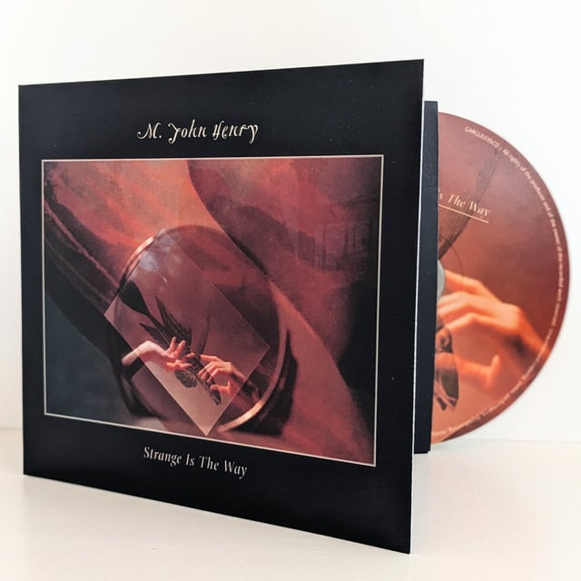 M. John Henry - 'Strange Is The way' - Limited Edition CD